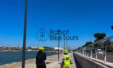 Official licensed Moroccan tourism guide badge worn by Rabat Bike Tours staff.