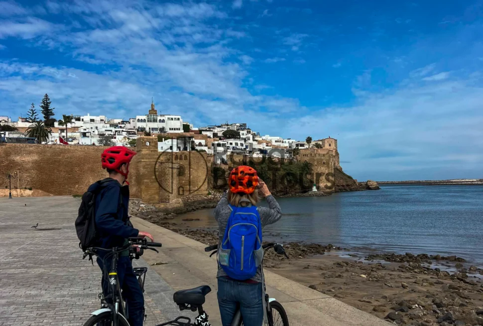 Row of high-quality electric bikes parked at the Udayas Kasbah entrance