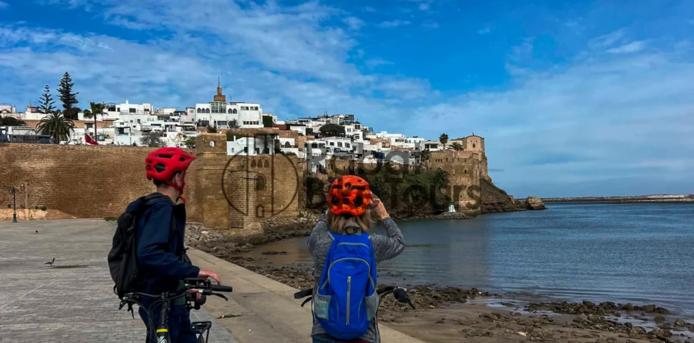 Row of high-quality electric bikes parked at the Udayas Kasbah entrance